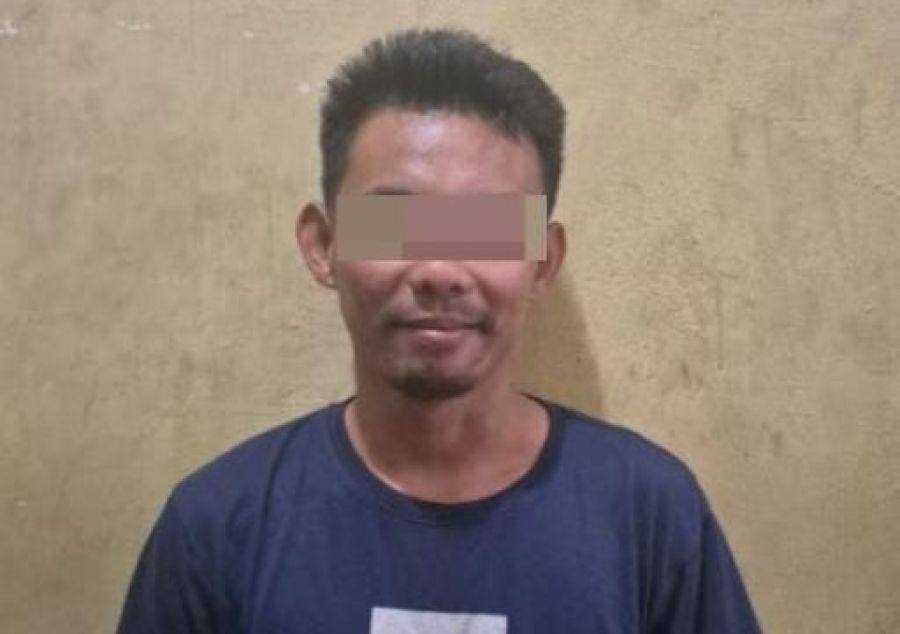 AY, pelaku penganiayaan mantan istrinya di Jalan Raya Sibang Kaja, Banjar Sintrig, Desa Sibang Kaja, Kecamatan Abiansemal, Kabupaten Badung. (foto/hes)