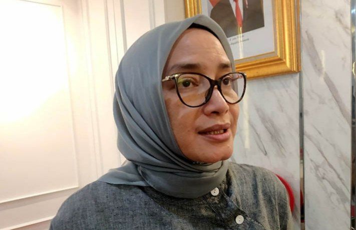 podiumnews.com-Presiden Jokowi Cabut Keppres Pemberhentian Anggota KPU Evi Novida