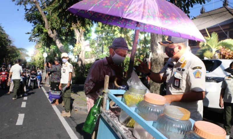 podiumnews.com-Satpol PP Bali: Penggunaan Masker Butuh Sosialisasi dan Edukasi
