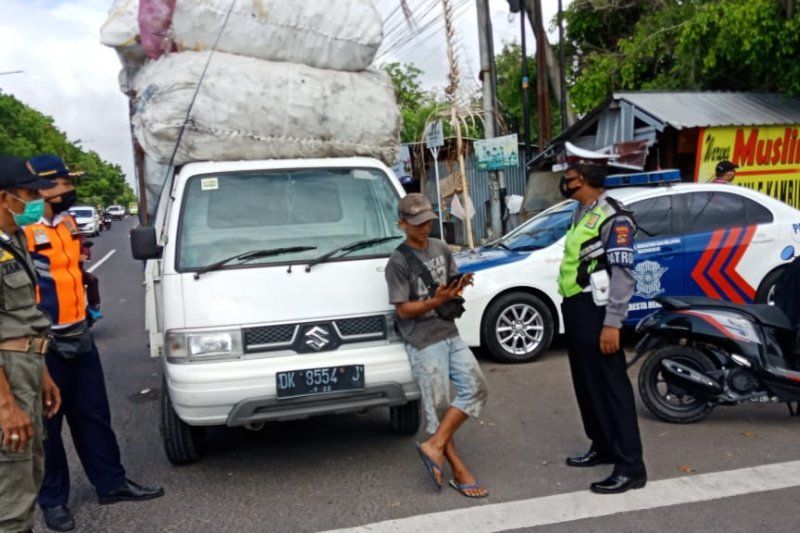 podiumnews.com-Tak Gunakan Masker, 12 Warga Denpasar Dikenai Sanksi Denda 