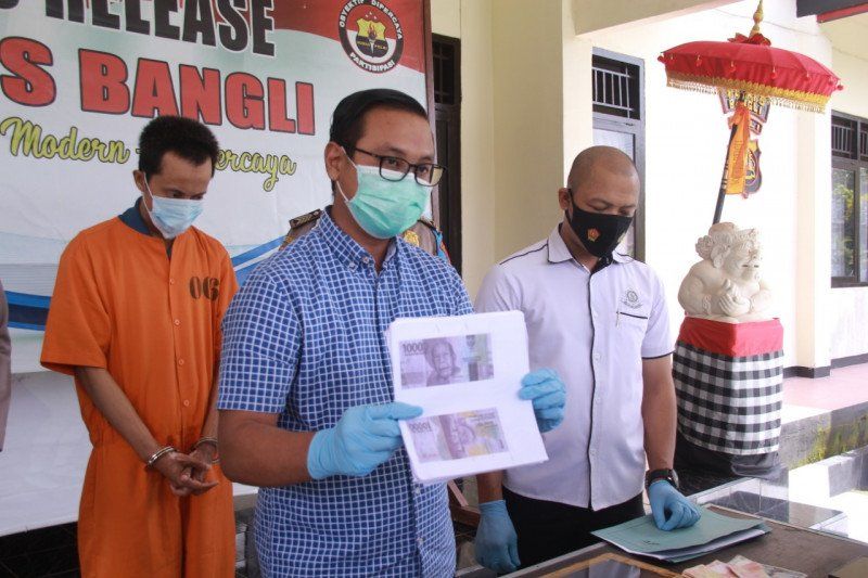 podiumnews.com-Pembuat dan Pengedar Uang Palsu di Bali Terancam 15 Tahun