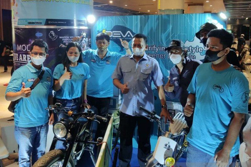 podiumnews.com-Gandeng Komunitas, PLN Bali Populerkan Kendaraan Bertenaga Listrik