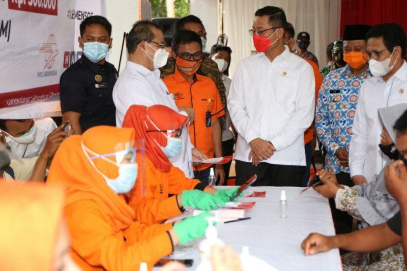 podiumnews.com-PT Pos Terus Salurkan BST di Kawasan Terluar dan Terpencil