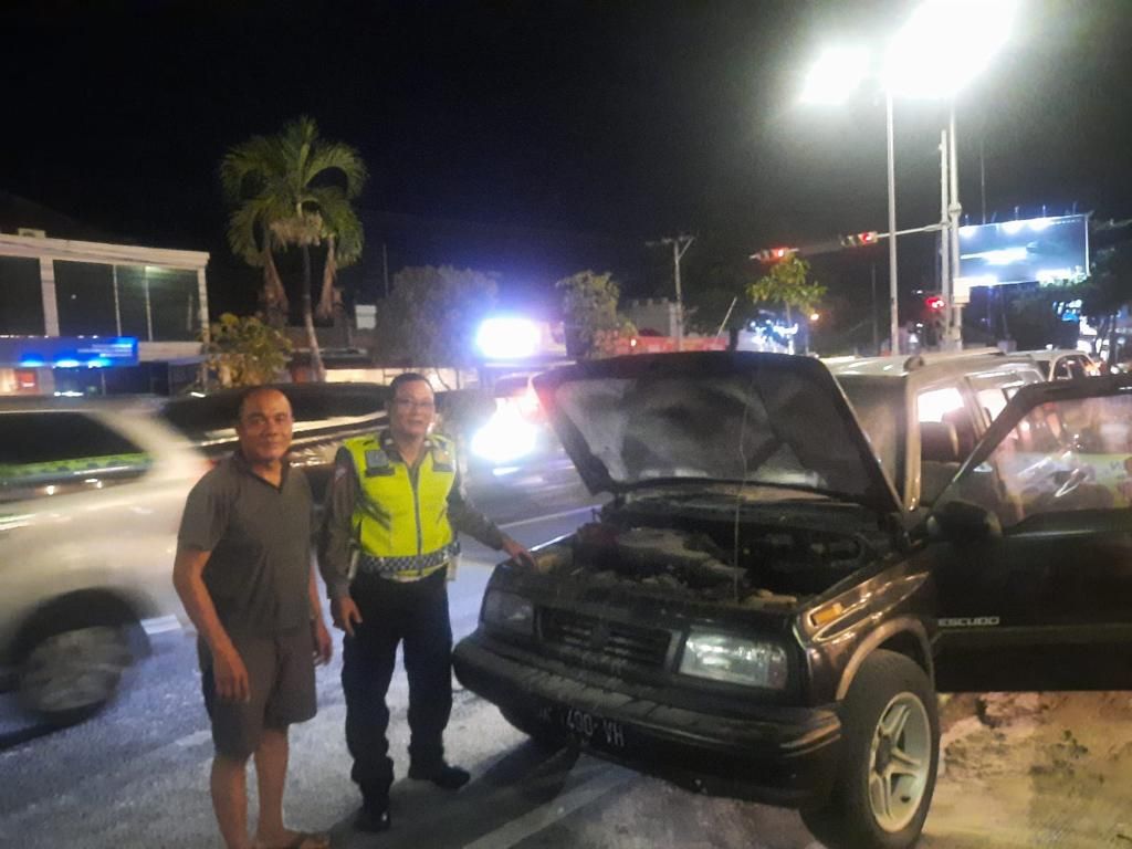 podiumnews.com-Mobil Escudo Alami Kebakaran di Kuta