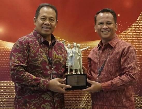 podiumnews.com-Terbaik Terapkan SKNBI, Pj Gubernur Apresiasi BPD Bali