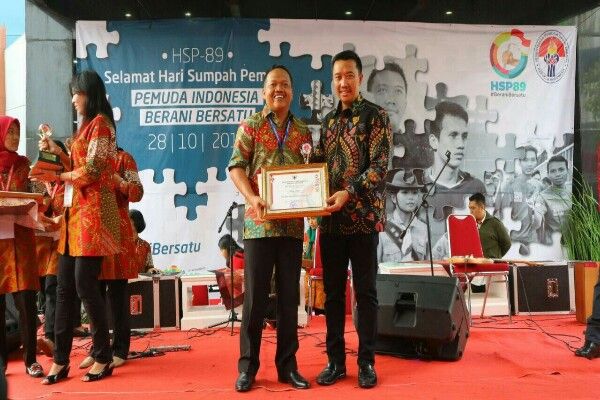 Made Artana, Founder STMIK Primakara Raih Juara I